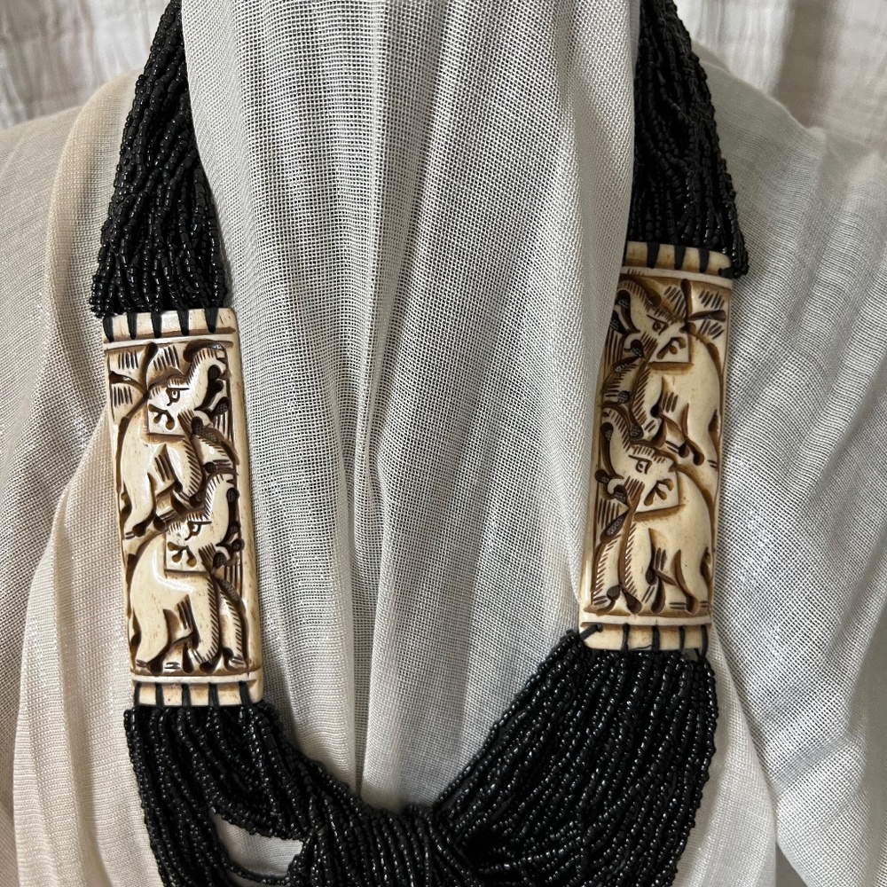 Tibetan necklace with carved elephants